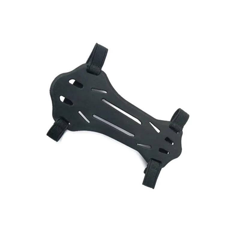 Black archery armguard with ventilation slots and adjustable straps on white background