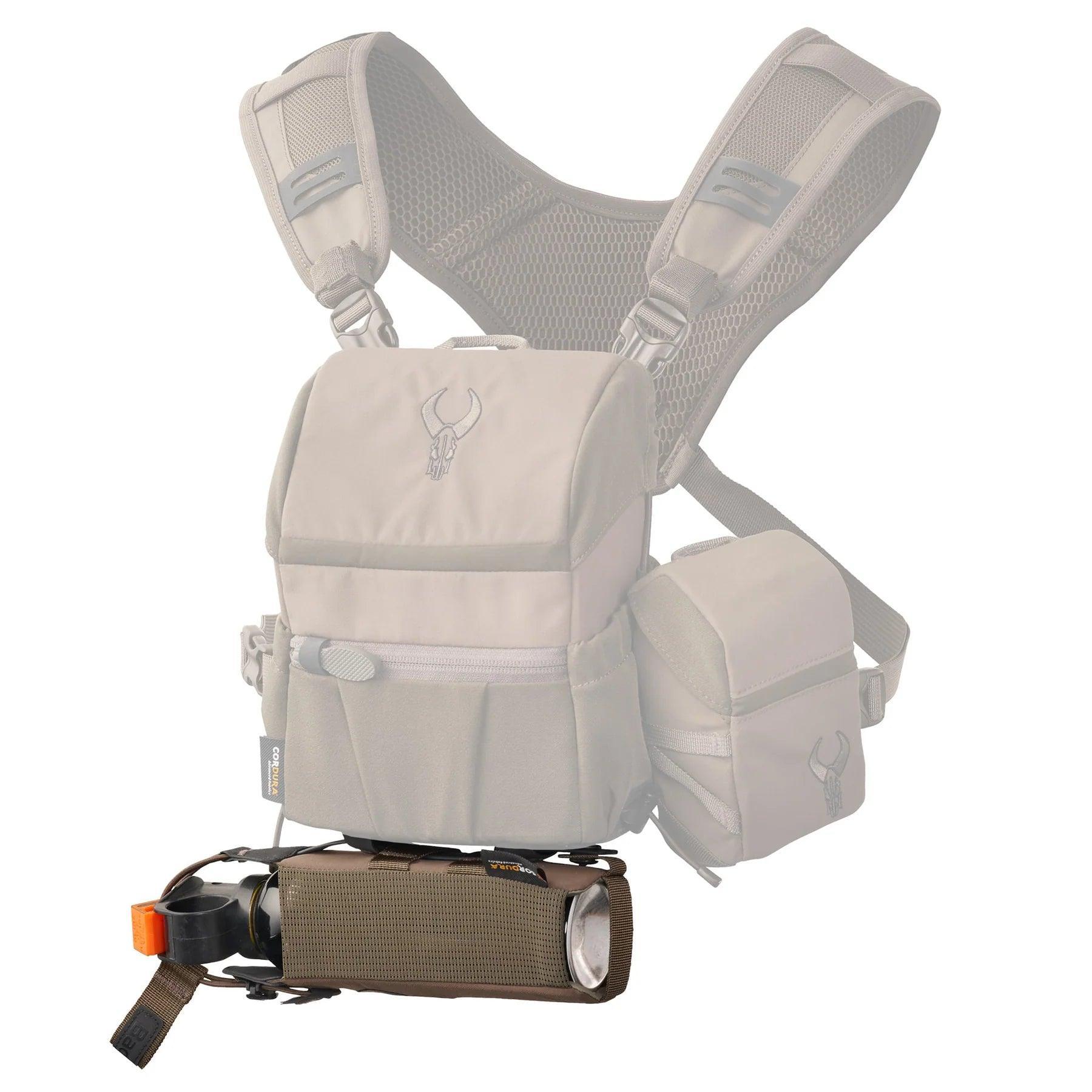 Badlands bear spray holder attached to tan tactical chest pack harness
