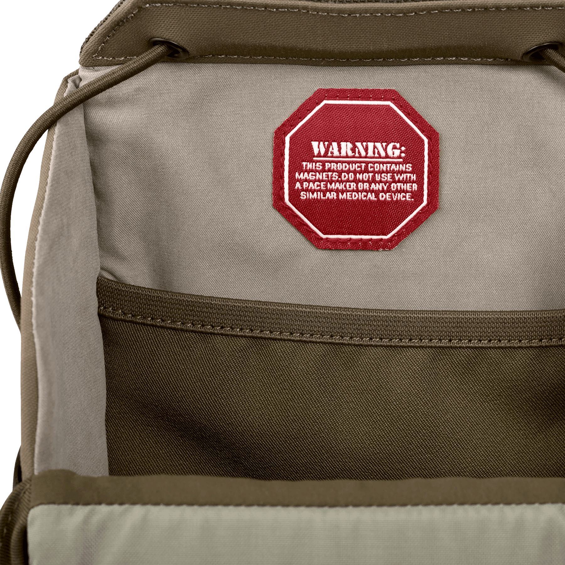 Closeup of Badlands Bino X2 pack interior with red magnetic warning label