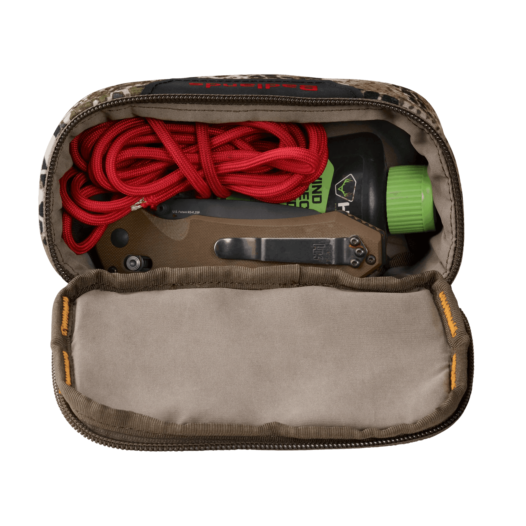 Open Badlands camo pouch holding red cord, utility knife, and green-lid bottle