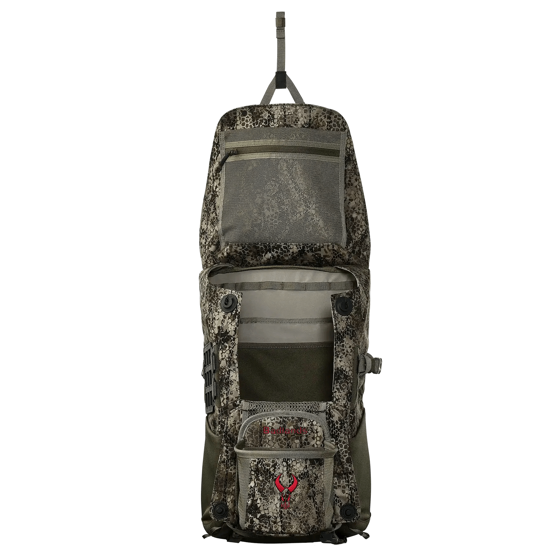 Open camouflage hunting backpack with multiple compartments and red Badlands logo