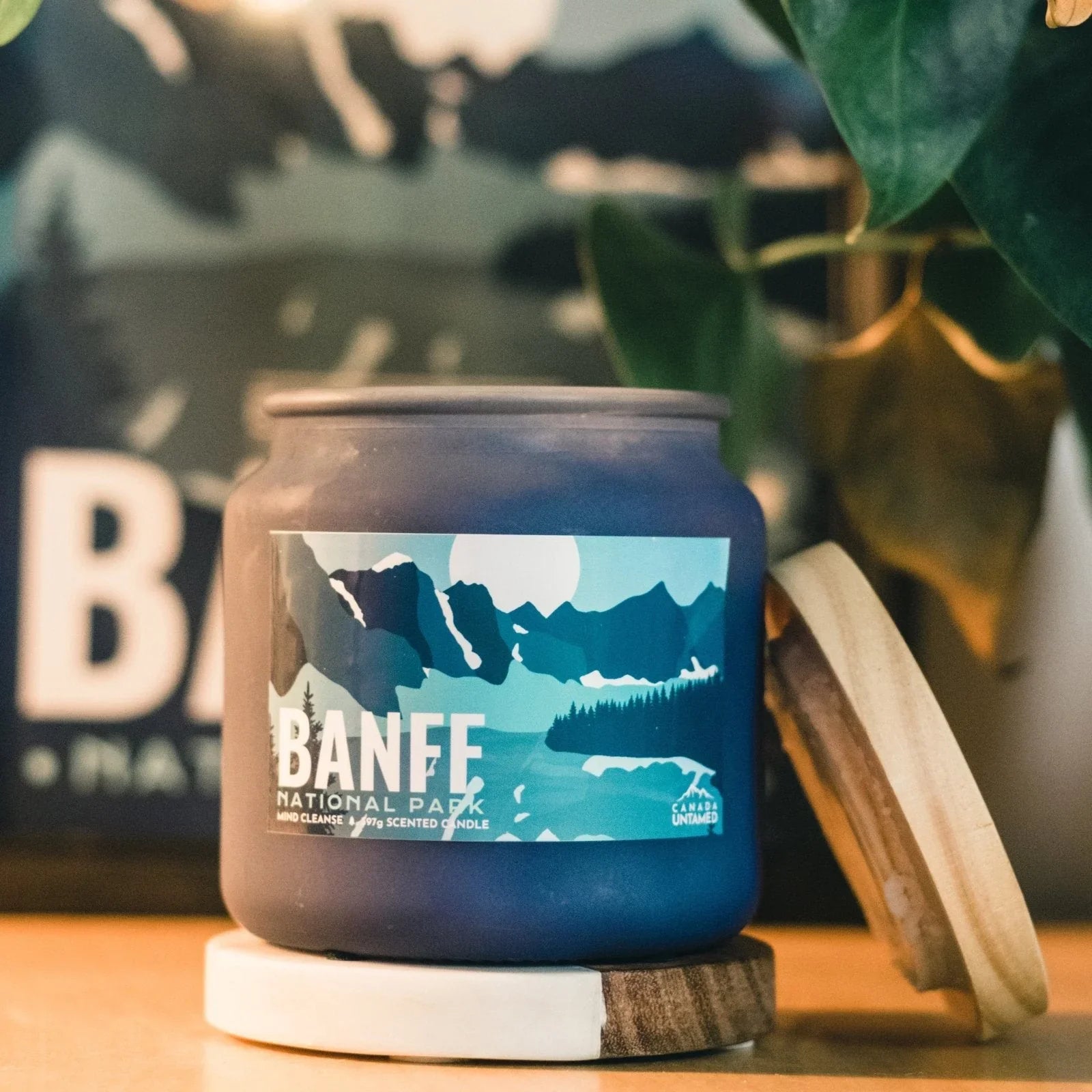 Banff National Park Mind Cleanse scented candle in a blue jar with mountain label