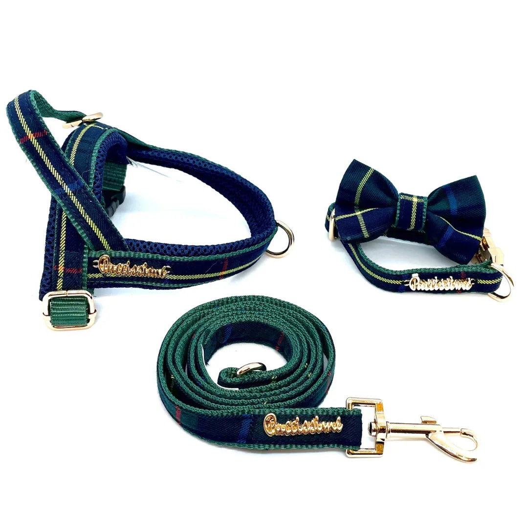 Plaid dog harness, leash, and bow tie collar set with gold hardware on white background