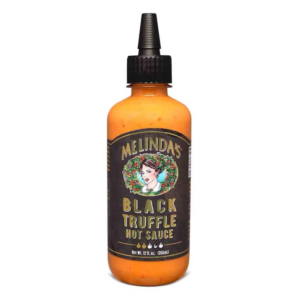 Melinda's Black Truffle Hot Sauce with Italian black truffles, cayenne peppers and Parmesan cheese for burgers, fries and pizza