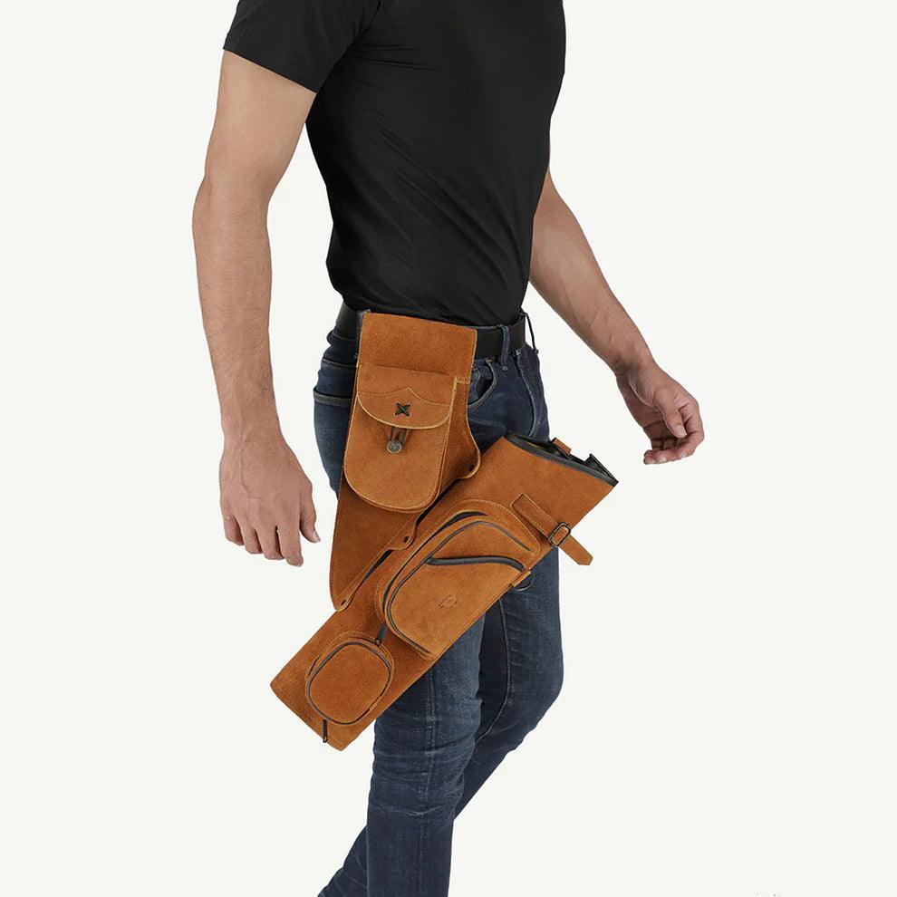 Man wearing honey brown suede leather thigh bag holster with multiple pockets