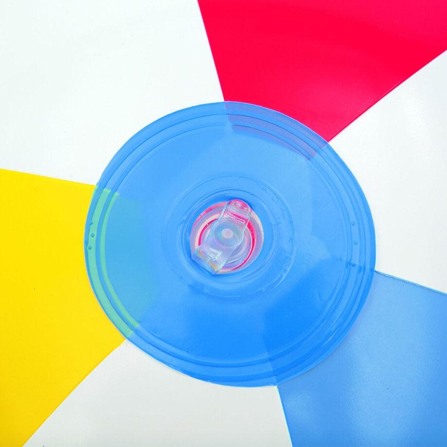 Close-up of Bestway beach ball air valve with red, blue, yellow, and white panels