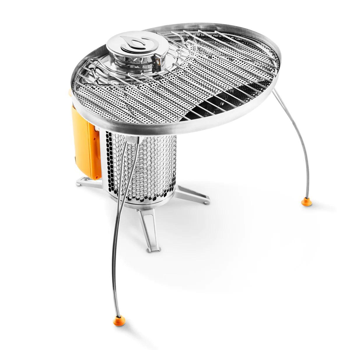 Biolite CampStove portable grill with metal grate and orange power unit on white background