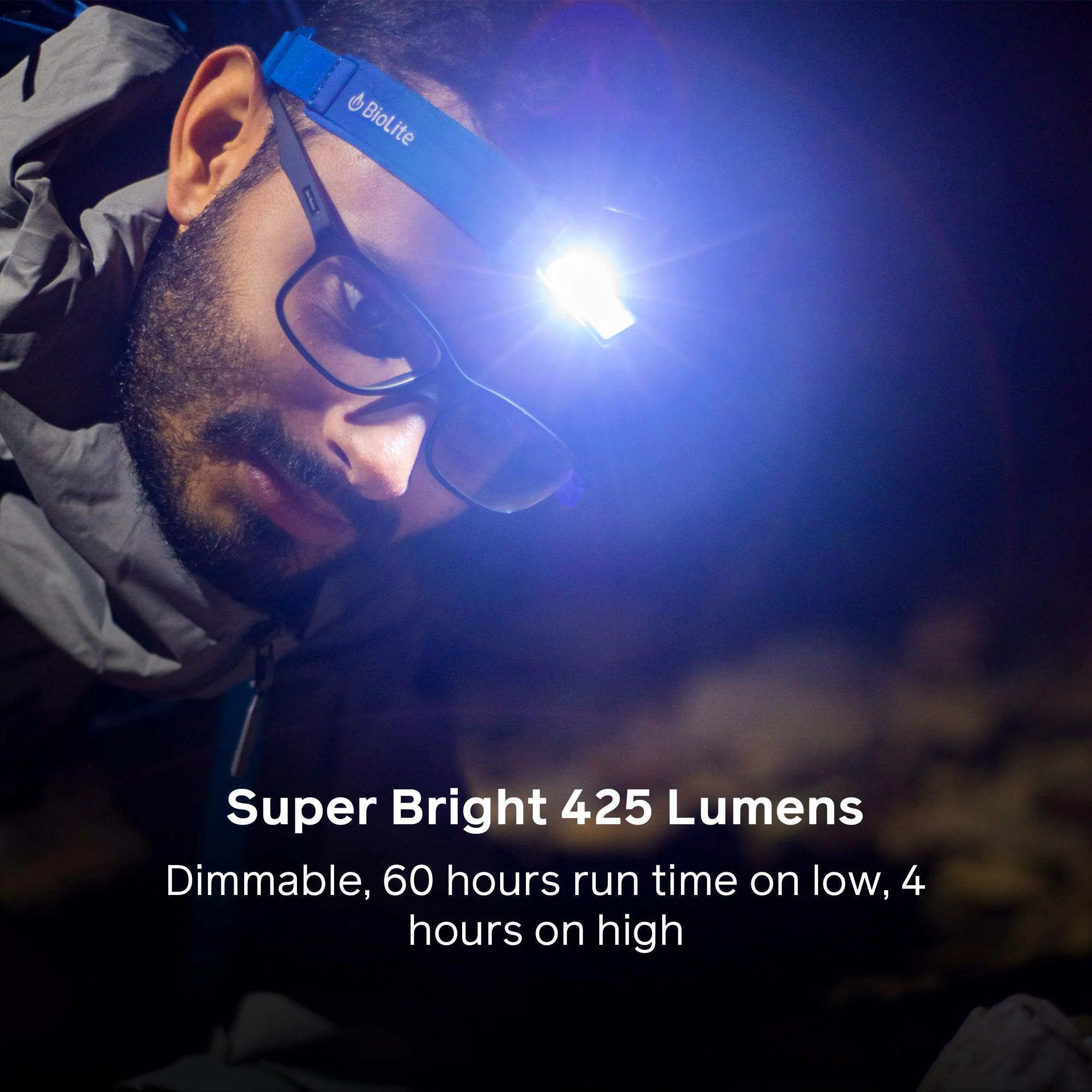 Man wearing BioLite headlamp 425 outdoors at night, super bright LED light in use
