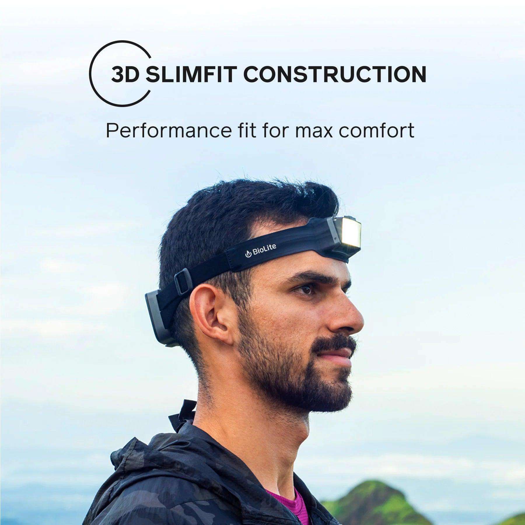 Man wearing BioLite headlamp outdoors, showcasing 3D slimfit construction for comfort
