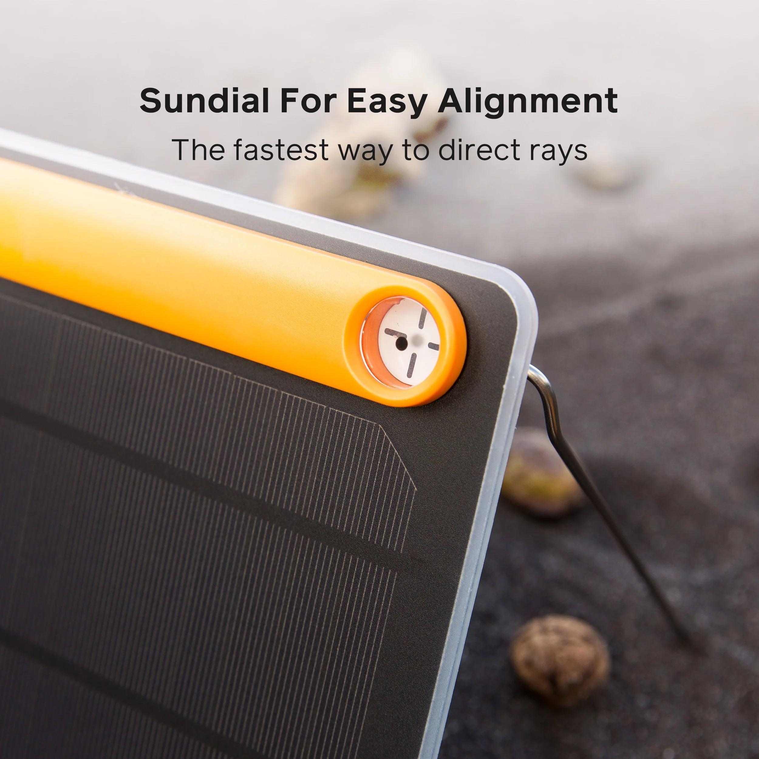BioLite SolarPanel 5 with built-in sundial and stand on outdoor surface
