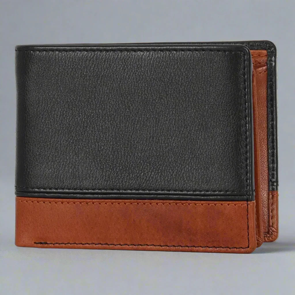 Black and brown leather bifold wallet on a plain gray background