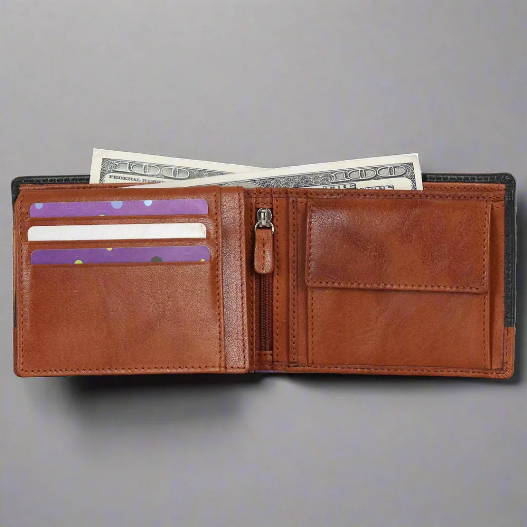 Open brown leather wallet with cash, credit cards, zipper pocket, and card slots on gray background