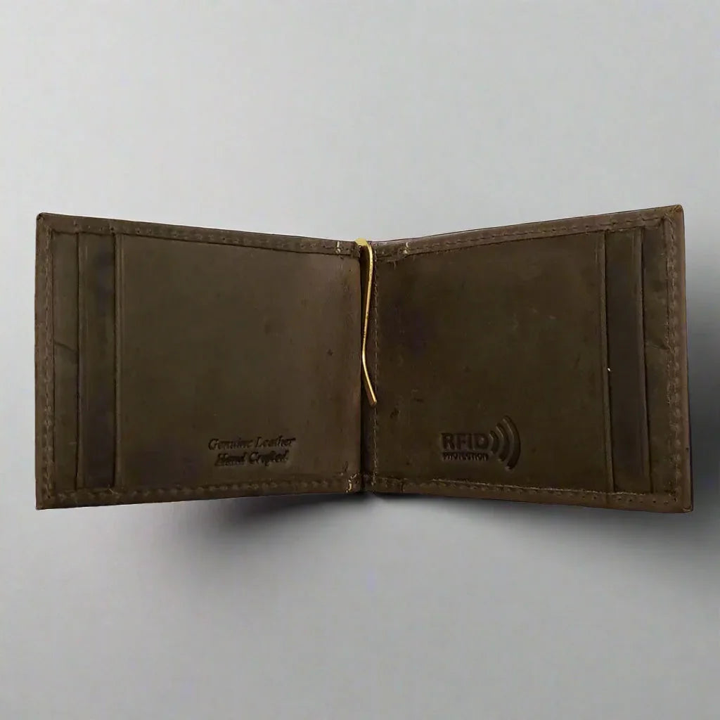 Men's distressed leather money clip wallet with RFID protection on light background