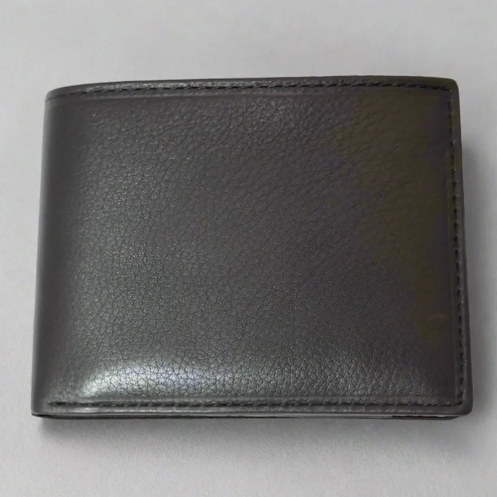 Black leather men's bifold wallet on light background