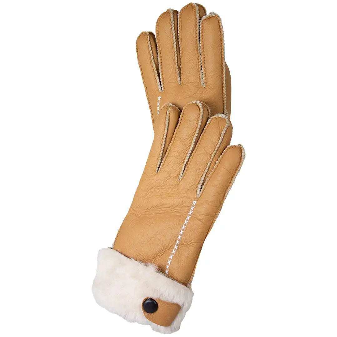 Tan women's merino sheepskin gloves with hand stitching and white fur cuffs