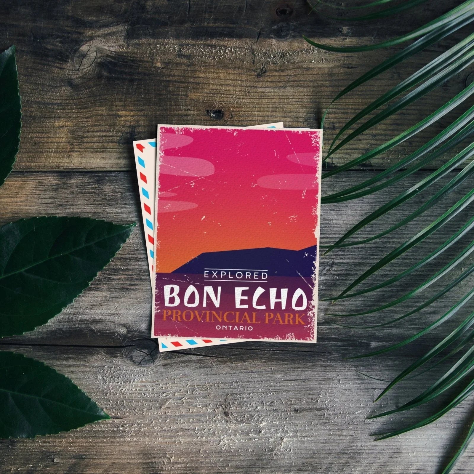 Bon Echo Provincial Park Ontario postcard with sunset design on rustic wood and green leaves