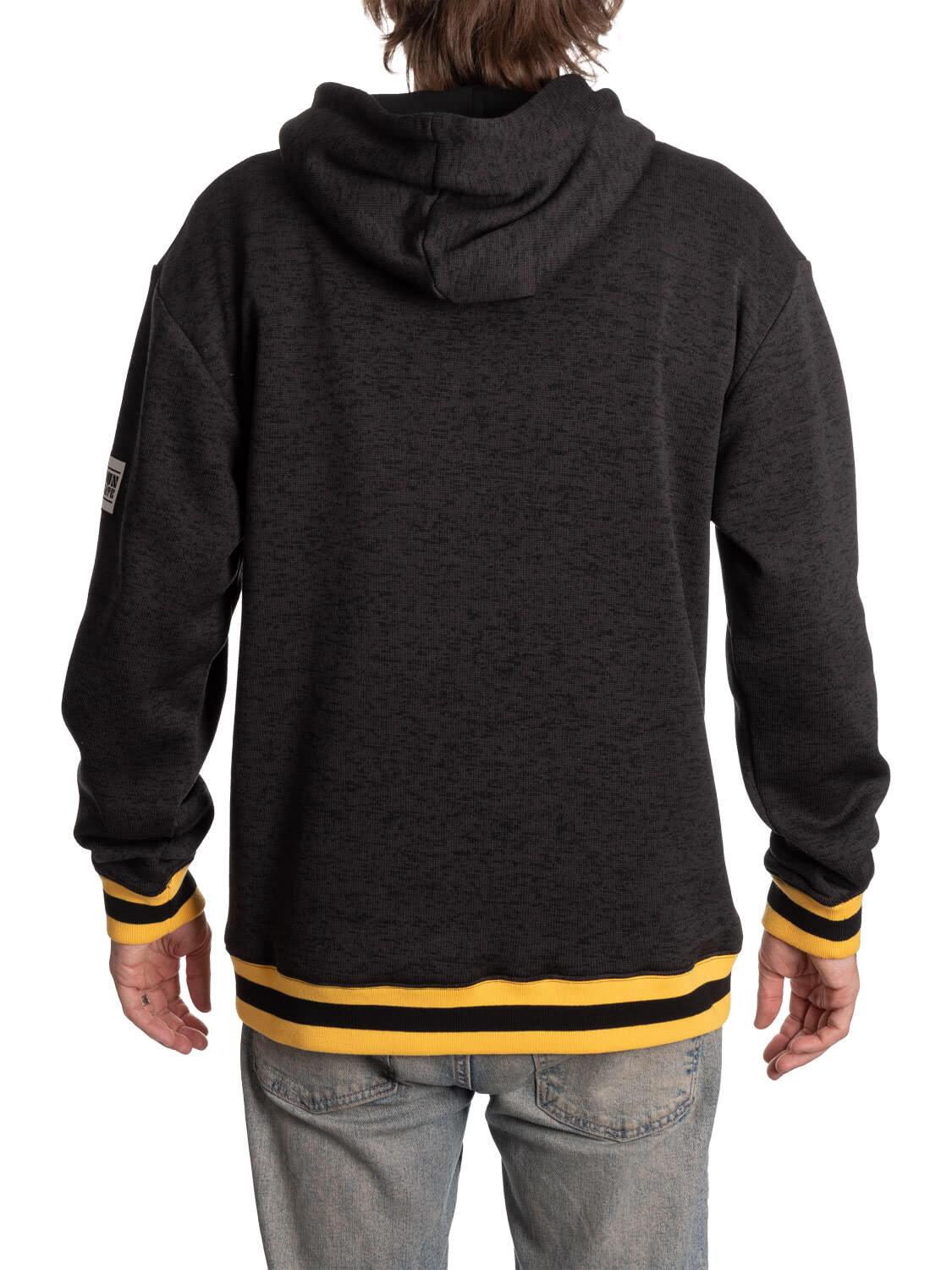 Back view of black hoodie with yellow and black striped cuffs and waist, casual style