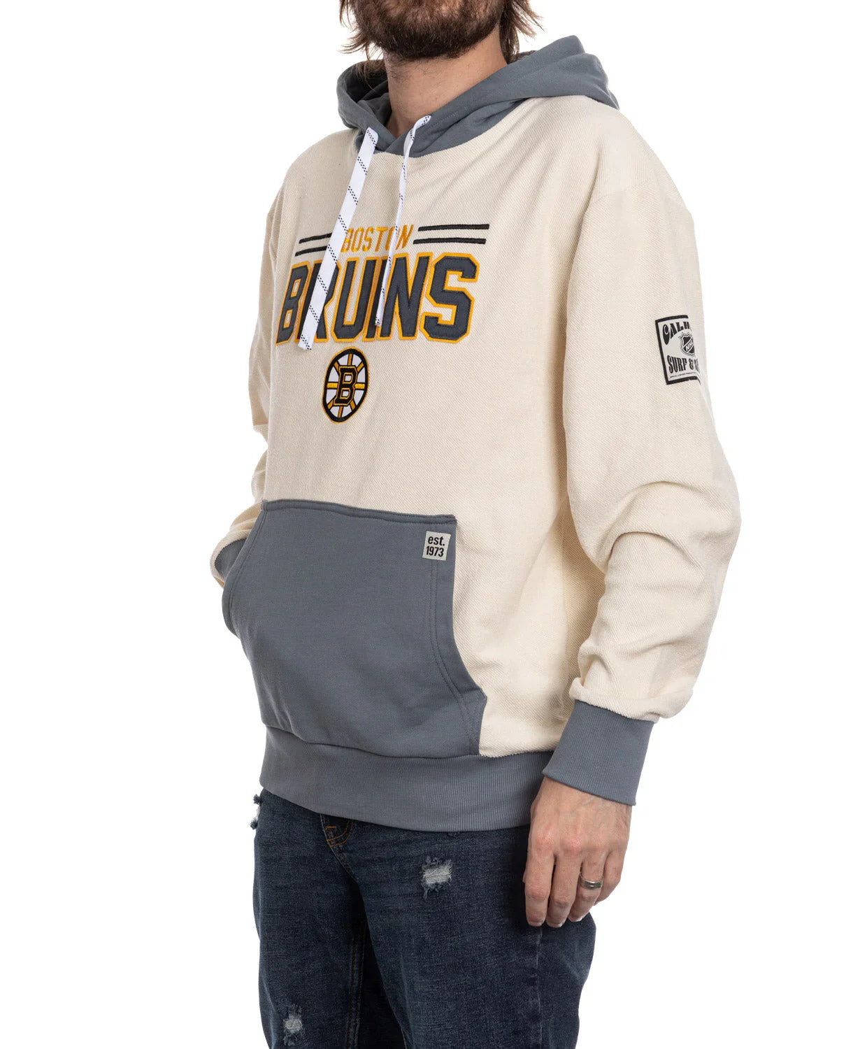 Boston Bruins reverse retro hoodie with grey accents and embroidered logo, worn by a model