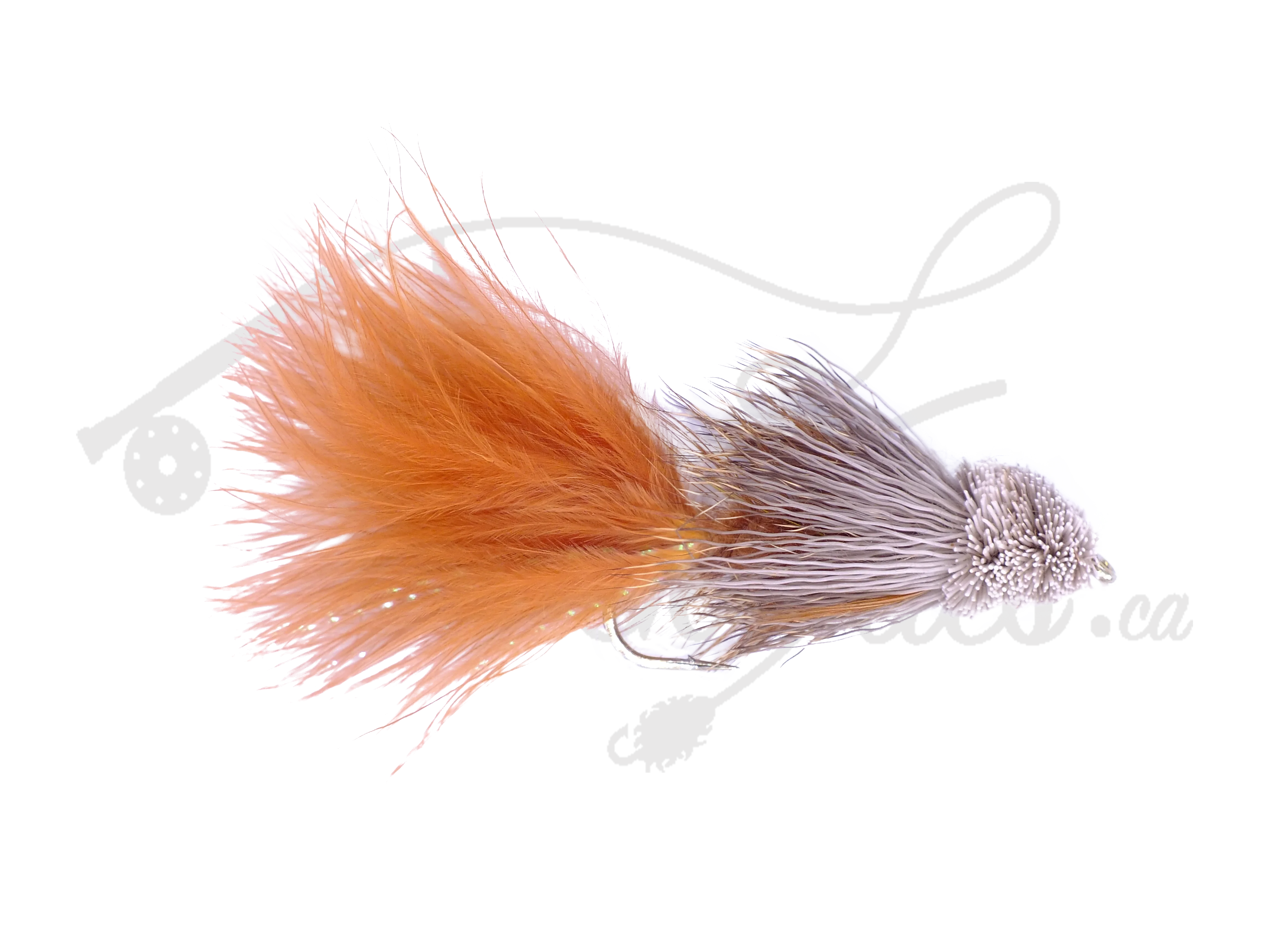 Brown Bow River Bugger fly fishing lure with bushy tail and sculpted head on white background