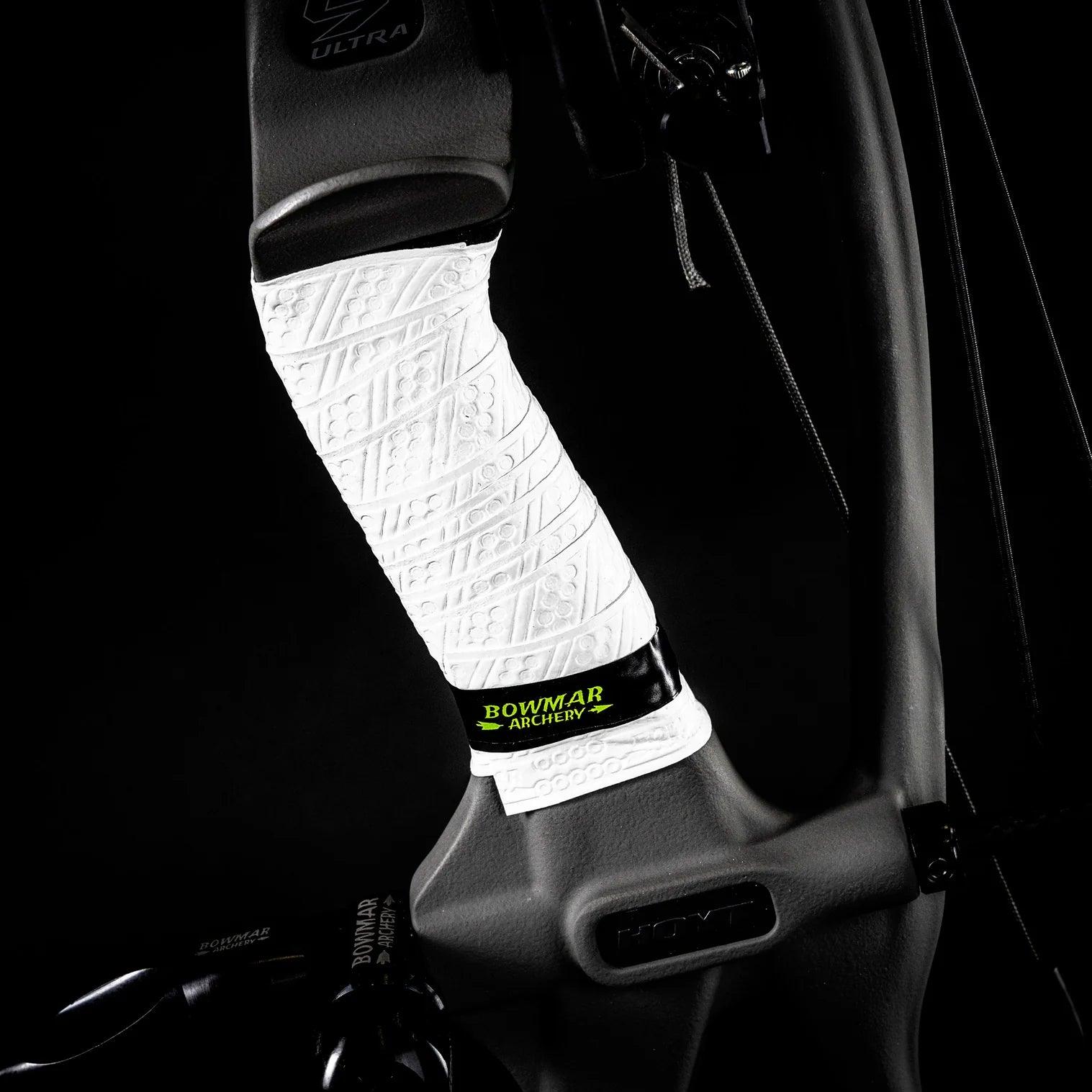 White Bowmar Archery grip wrap on black Hoyt compound bow handle