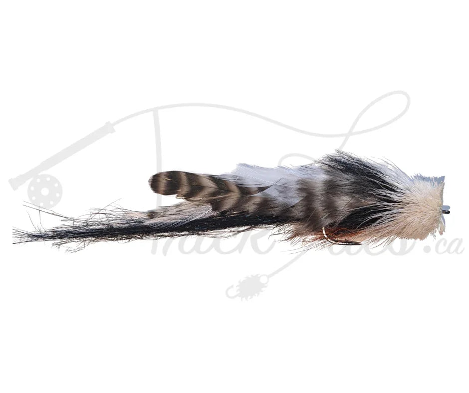Buford black and orange fly fishing streamer with barred feathers and fur on white background