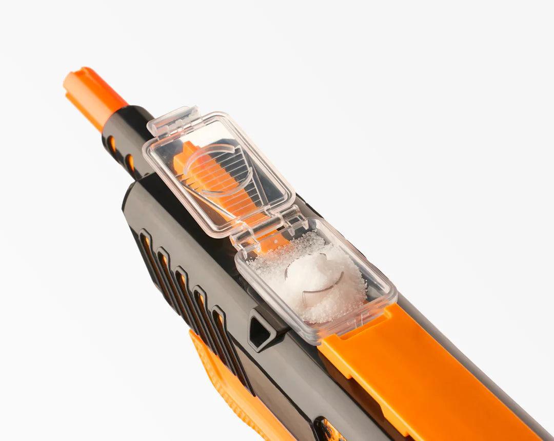 Close-up of a salt-loading compartment on an orange and black bug salt gun