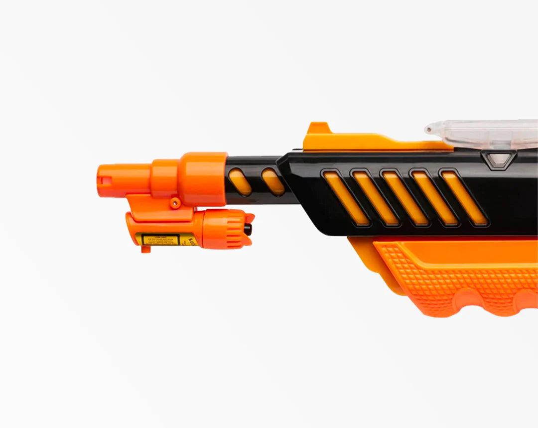 Close-up of an orange and black plastic toy gun barrel with textured grip on white background