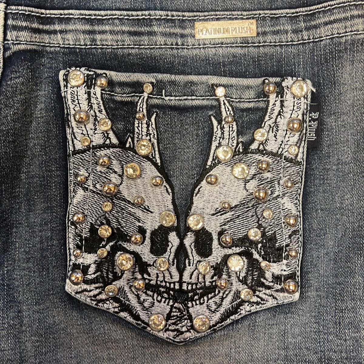 Denim jeans back pocket with rhinestone-studded skull design, Platinum Plush label