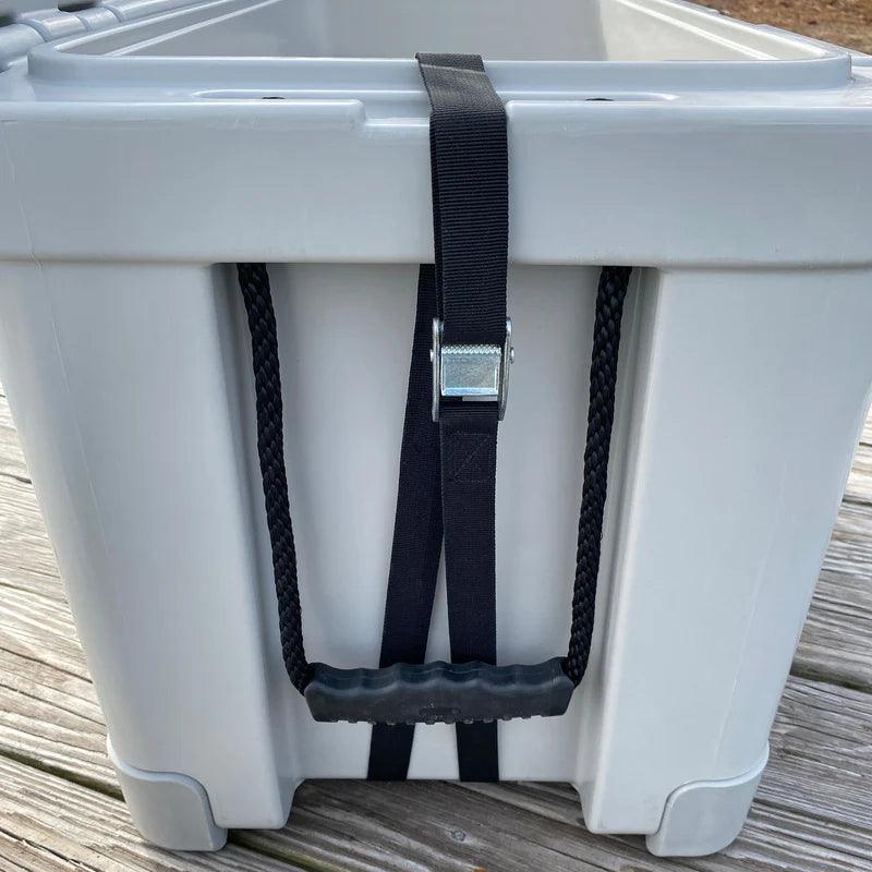 Heavy-duty gray plastic storage bin with black strap handle on wooden deck
