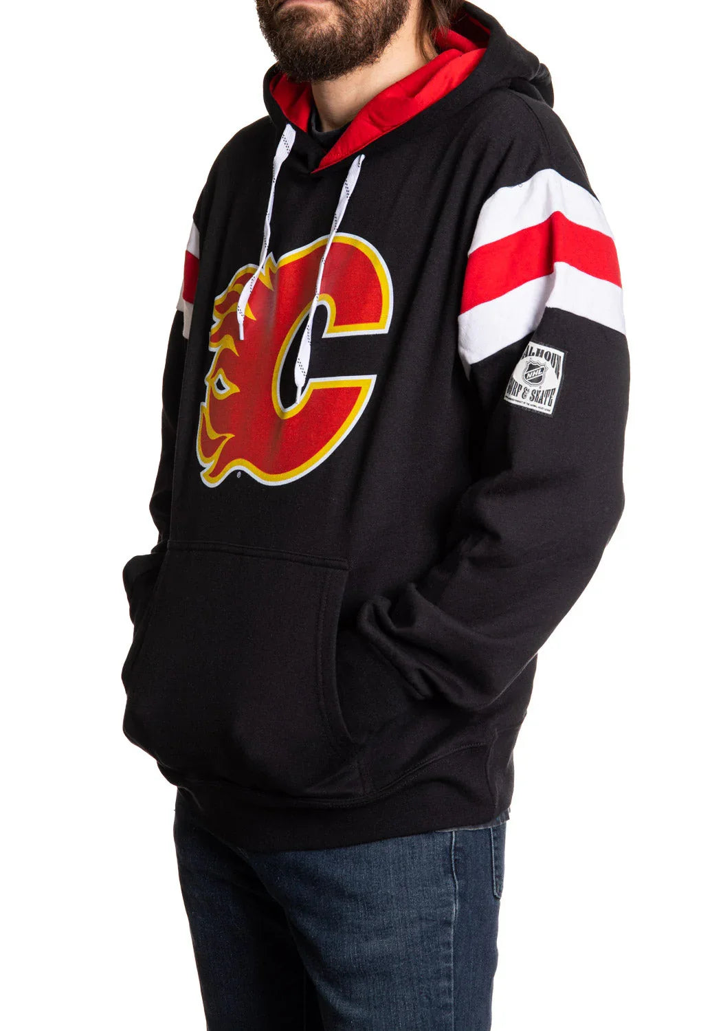 Man wearing black Calgary Flames varsity hoodie with red and white stripes and logo