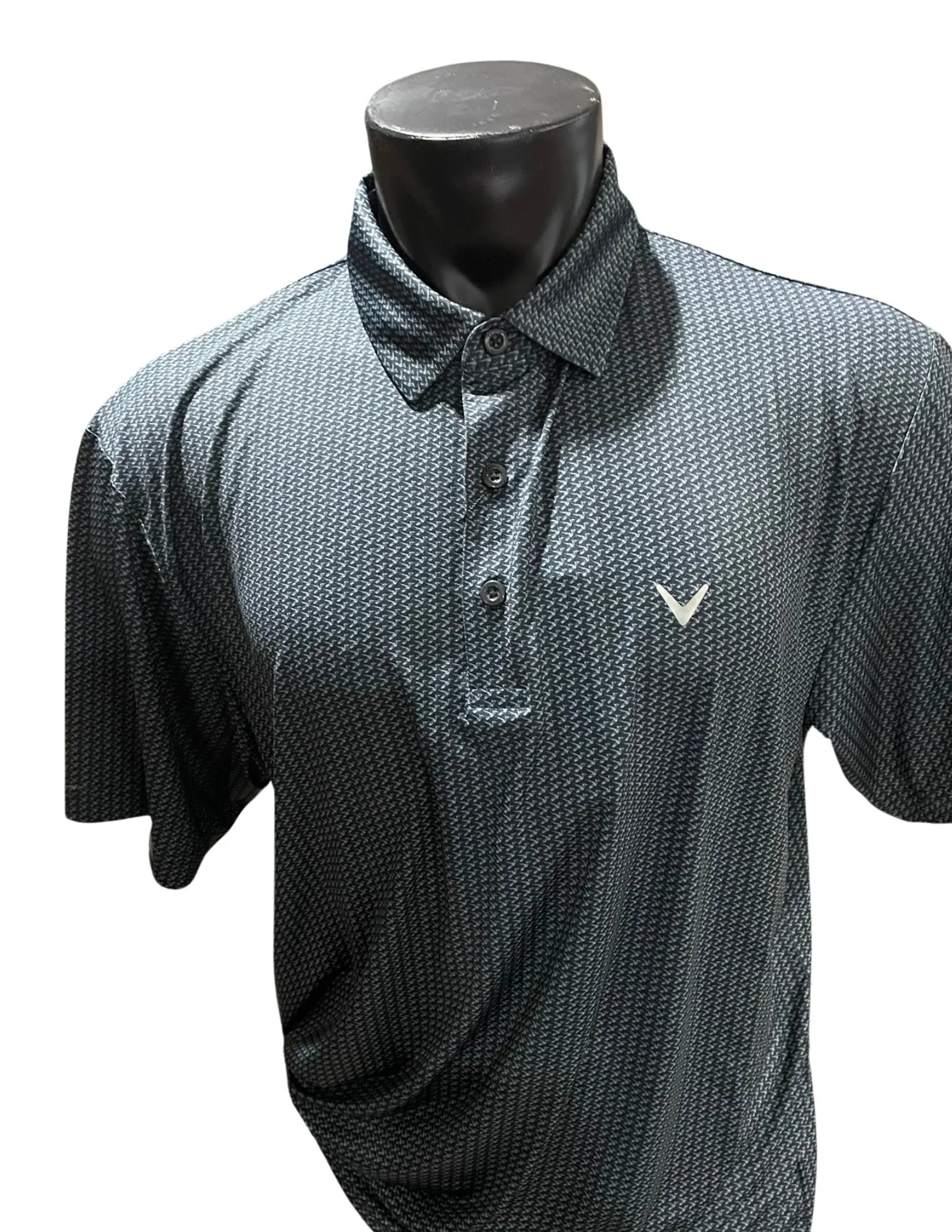 Men's black patterned Callaway golf polo shirt with collar, button placket, and white logo