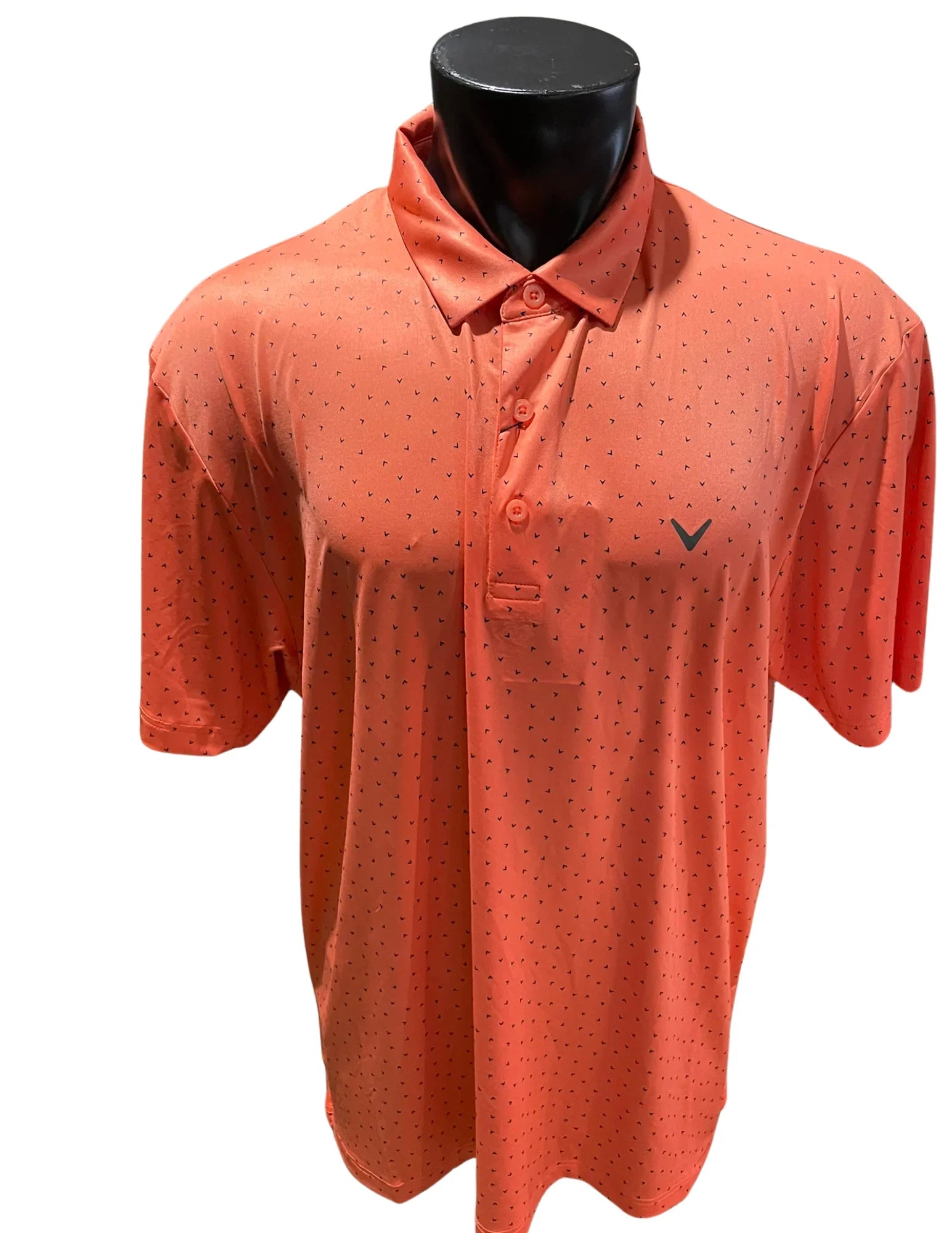 Men's orange golf polo shirt with small black pattern and Callaway logo on mannequin