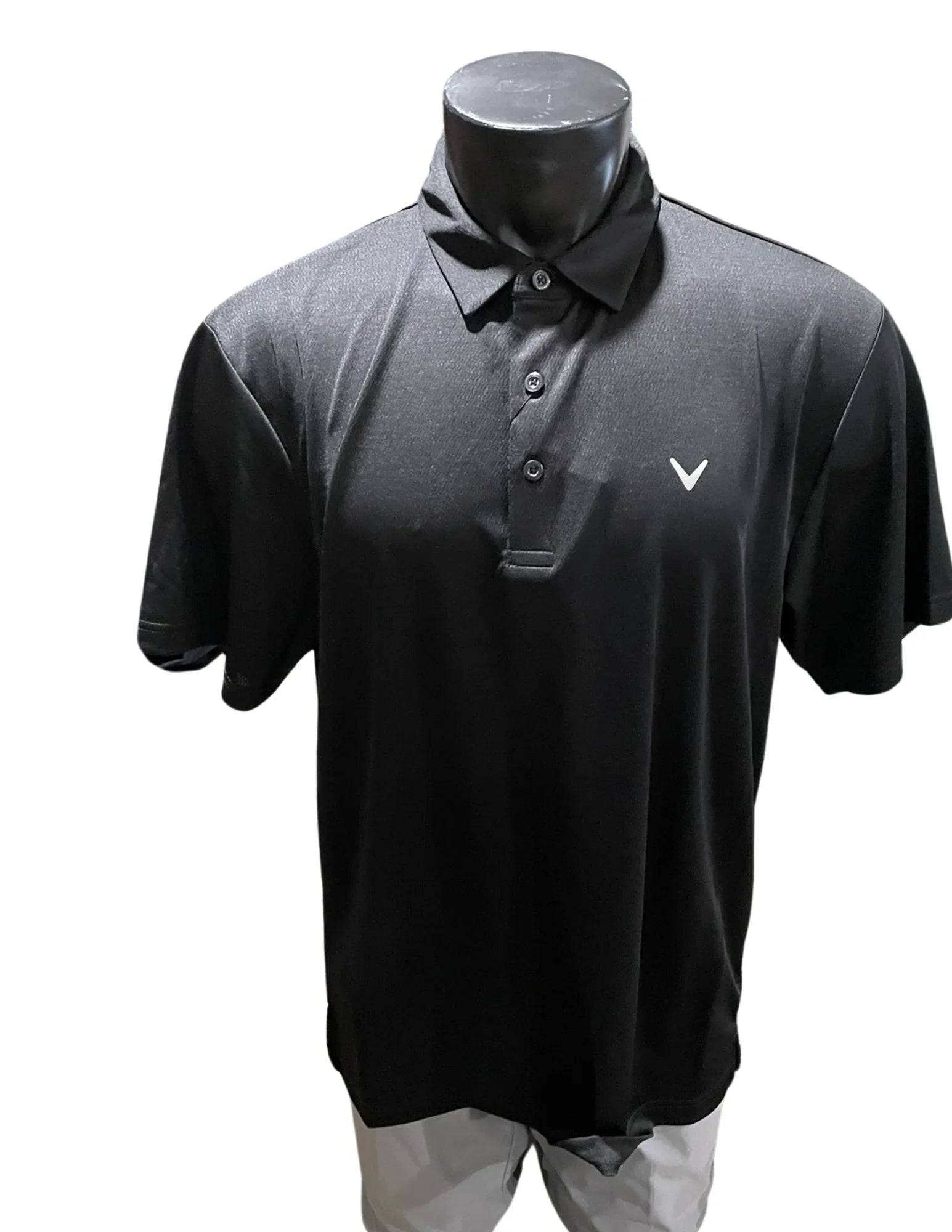 Black Callaway golf polo shirt on mannequin with white logo, short sleeves