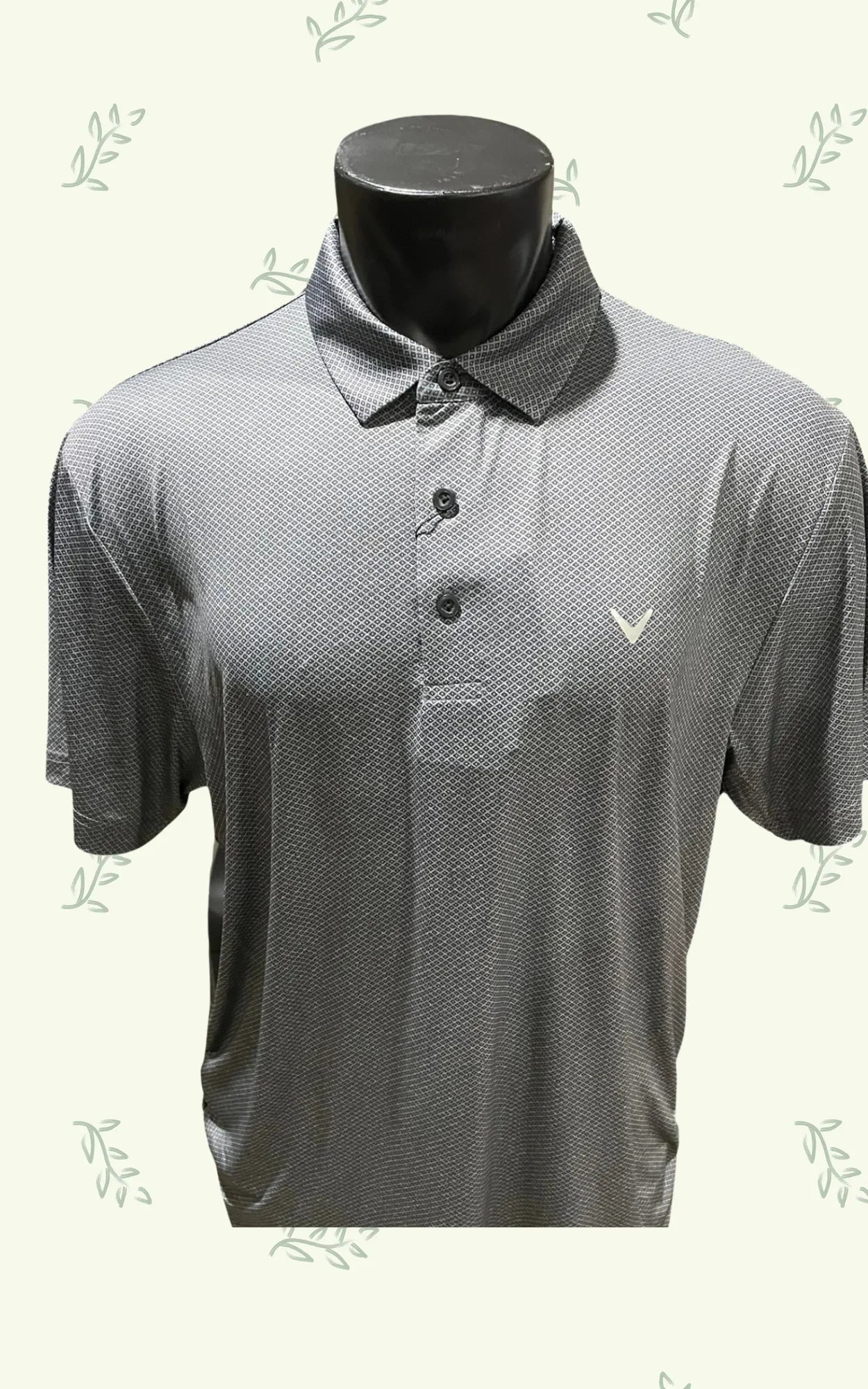 Gray Callaway golf polo shirt with subtle geometric pattern on mannequin