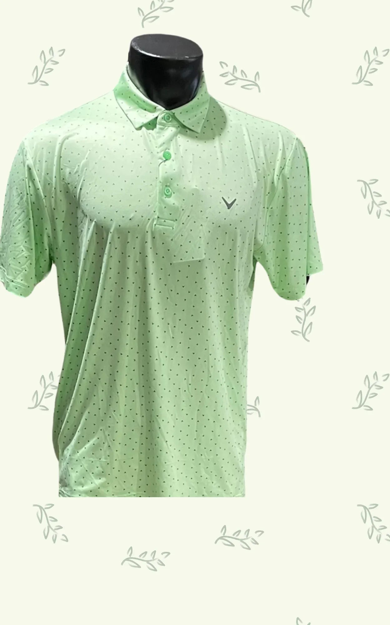 Light green men's golf polo shirt with small black dot pattern on mannequin