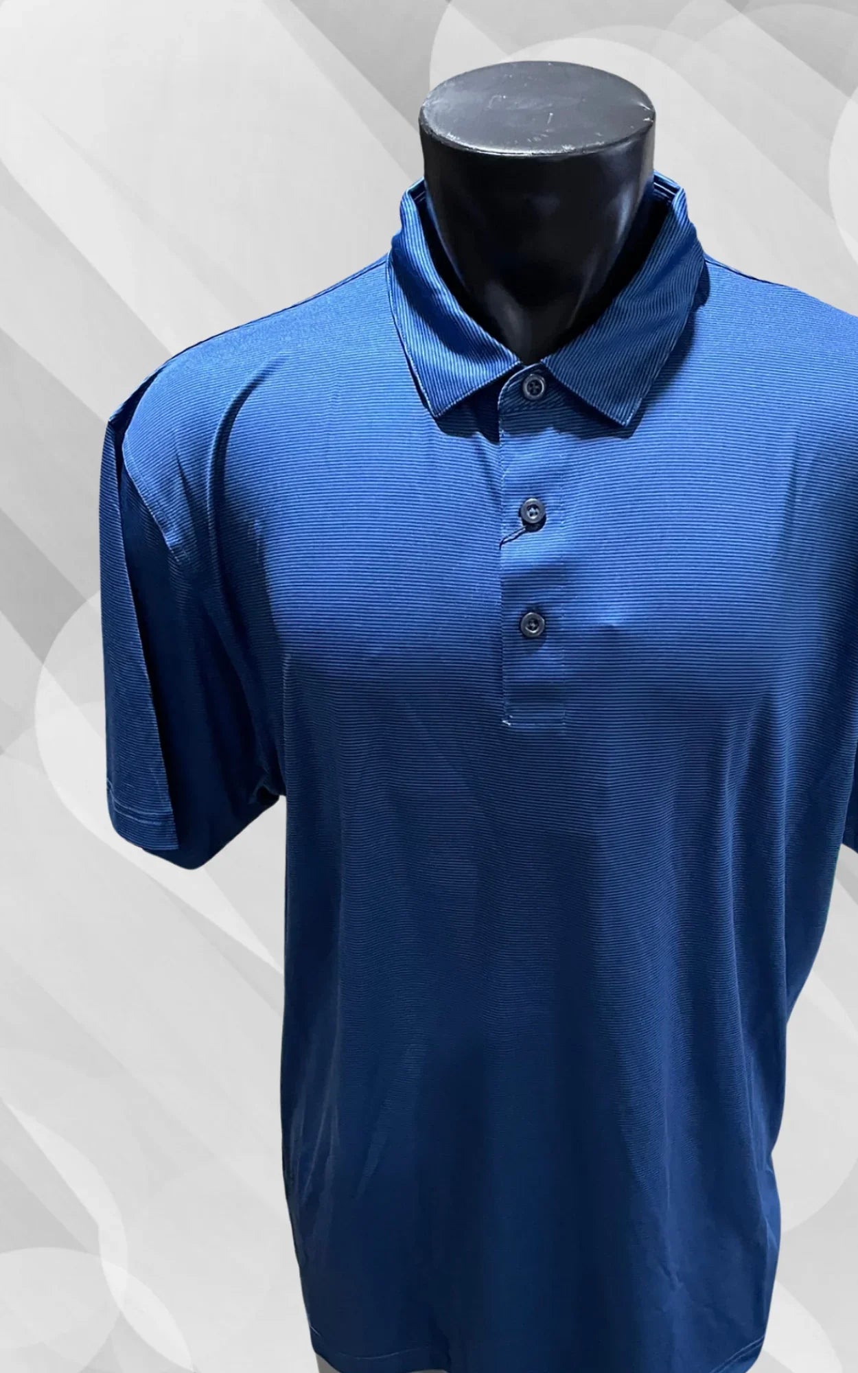 Blue short sleeve golf polo shirt with collar and buttons on mannequin