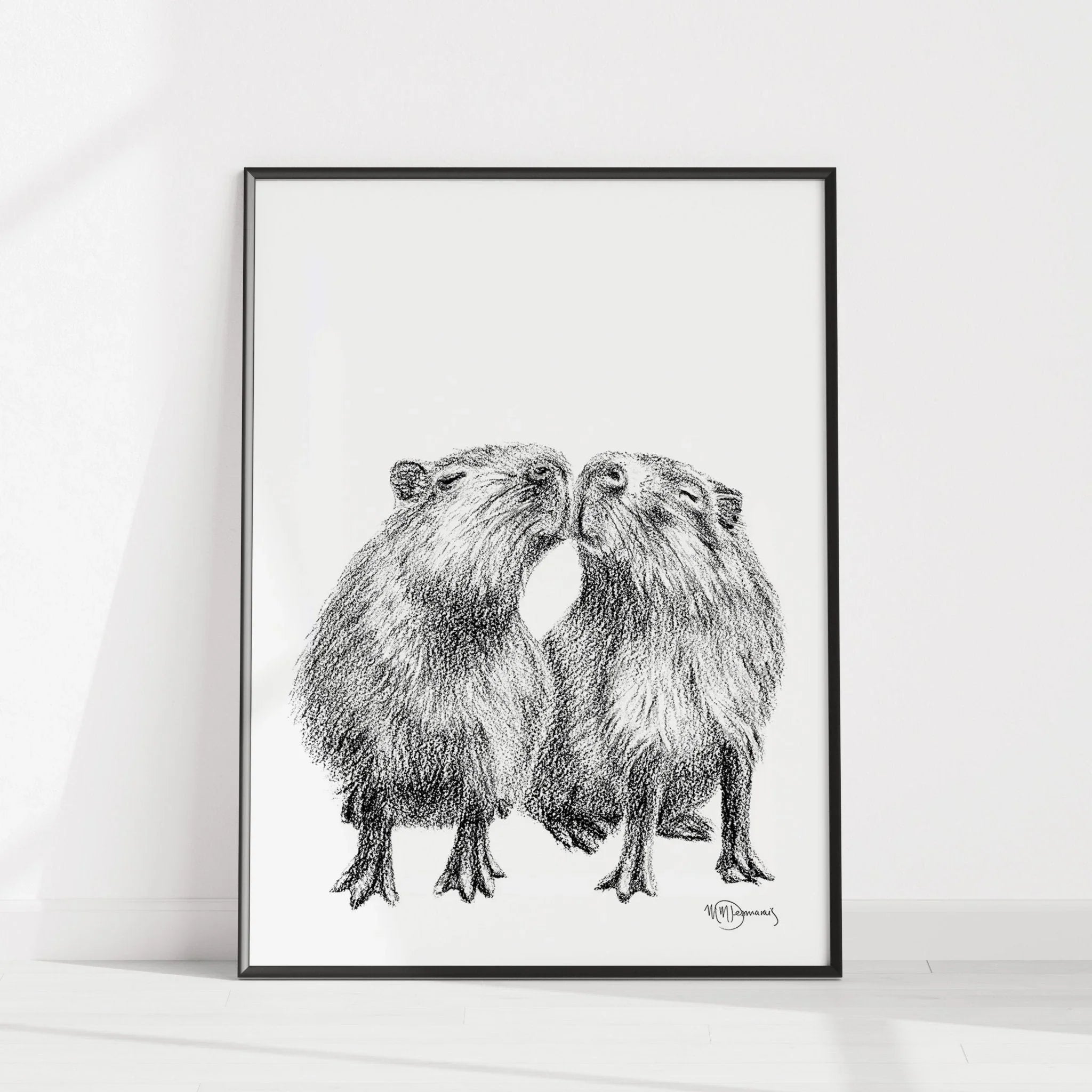 Framed black and white illustration of two capybaras nuzzling, minimalist wall art