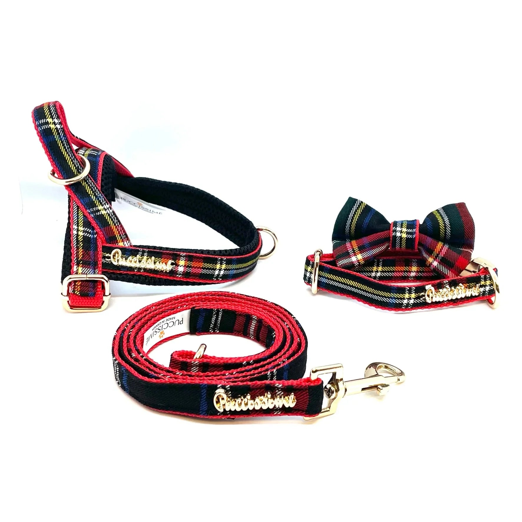 Red plaid dog harness, leash, and collar set with gold hardware and bow tie