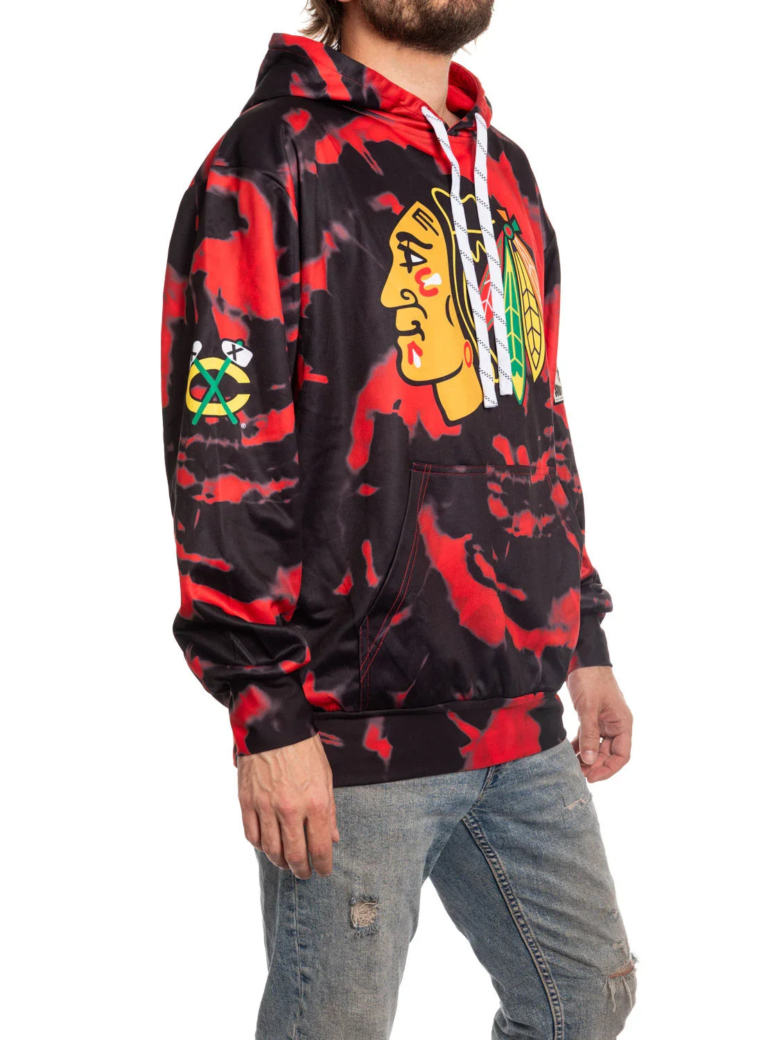 Man wearing Chicago Blackhawks red and black sublimation hoodie with logo and blue jeans