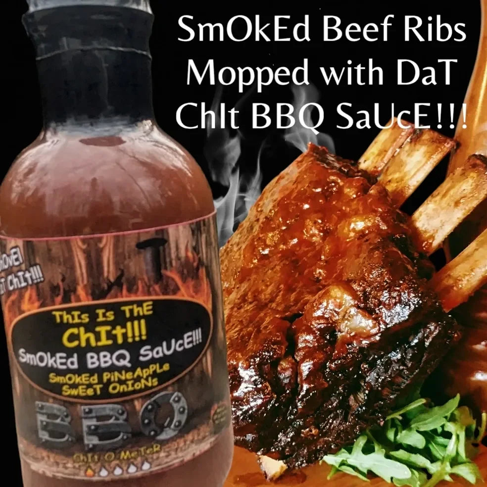 Smoked beef ribs with DaT Chit BBQ sauce bottle, smoked pineapple sweet onions flavor.