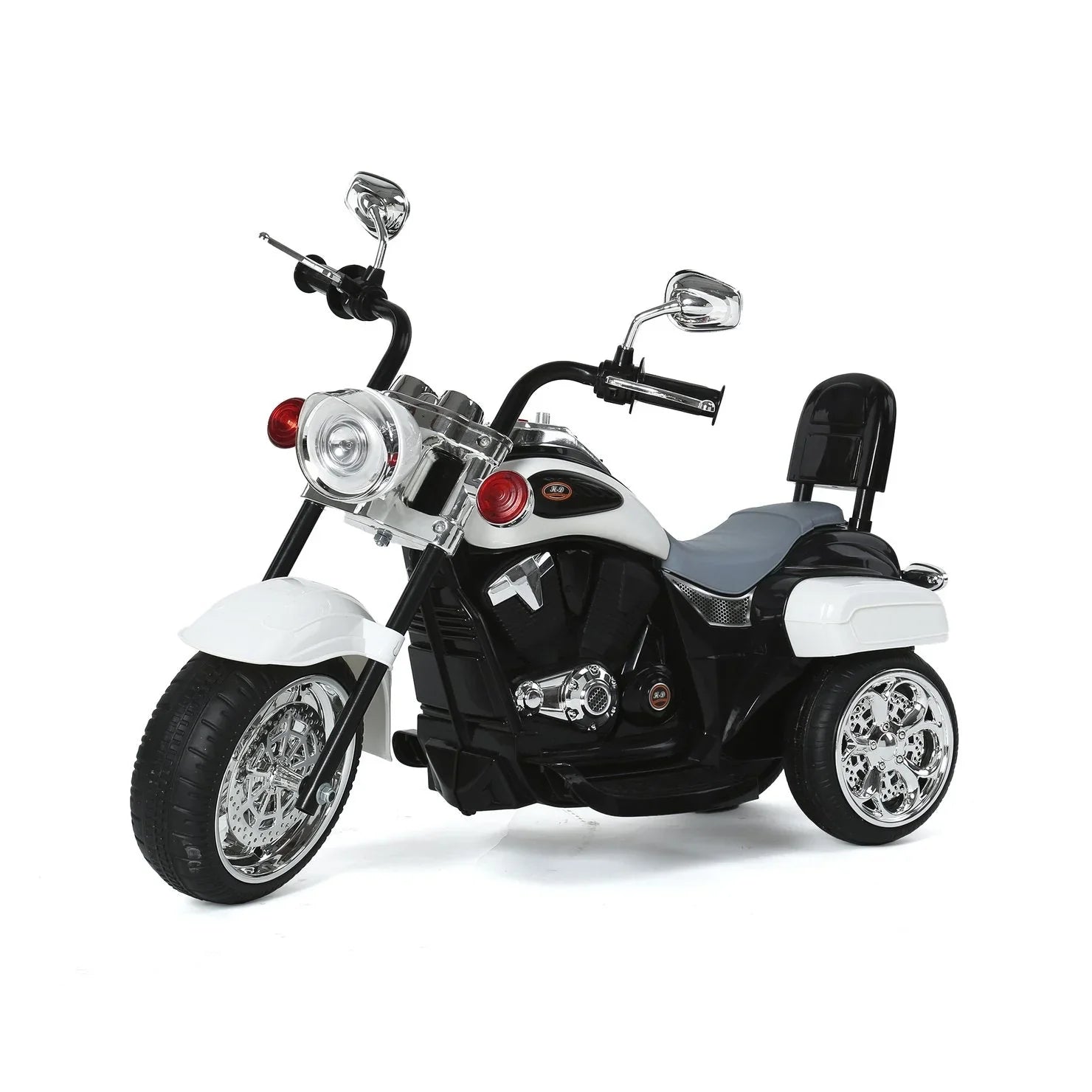 White kids ride-on motorcycle trike with chrome wheels and black seat on white background