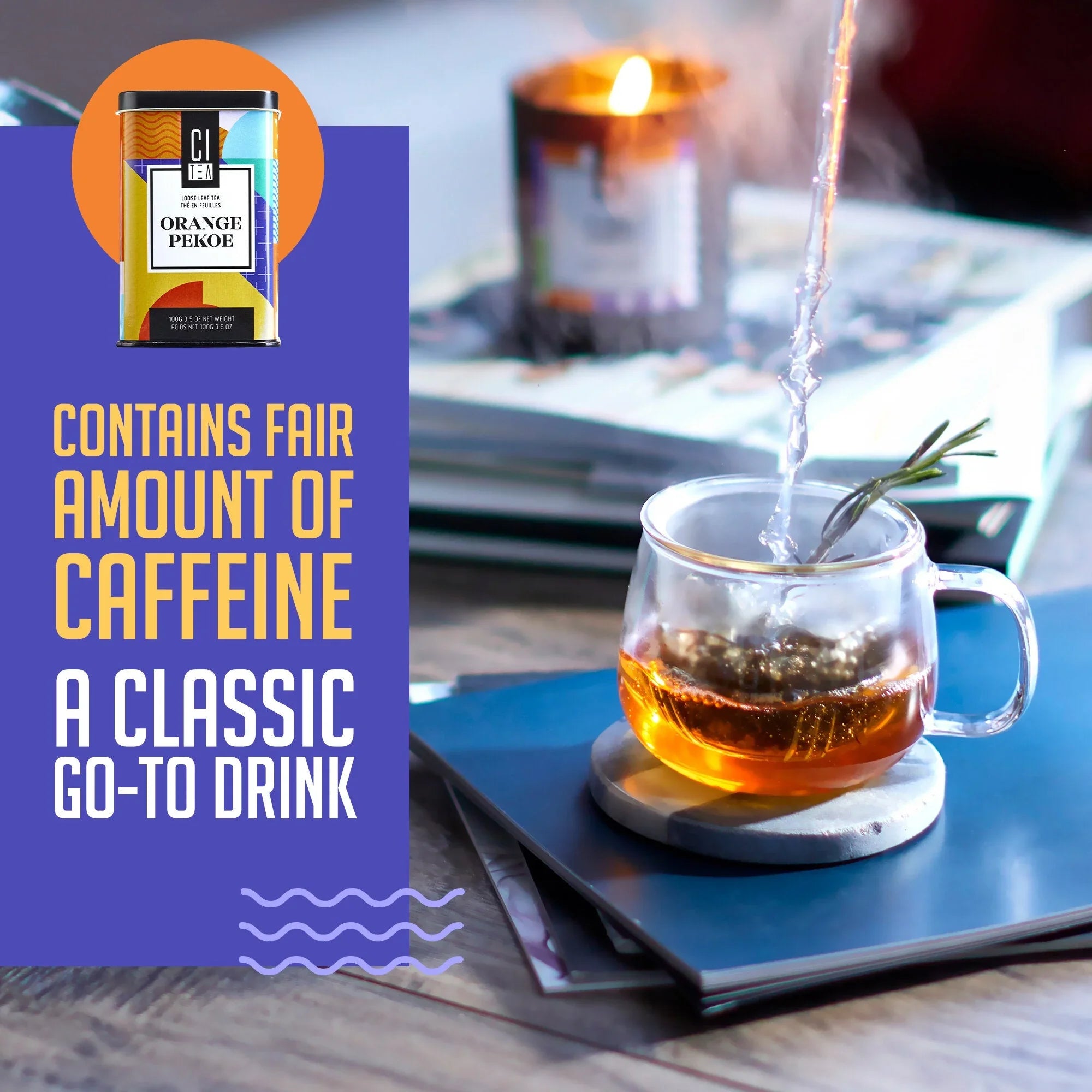 Citea Orange Pekoe tea can, glass teacup with herbal tea, cozy candle, and magazines