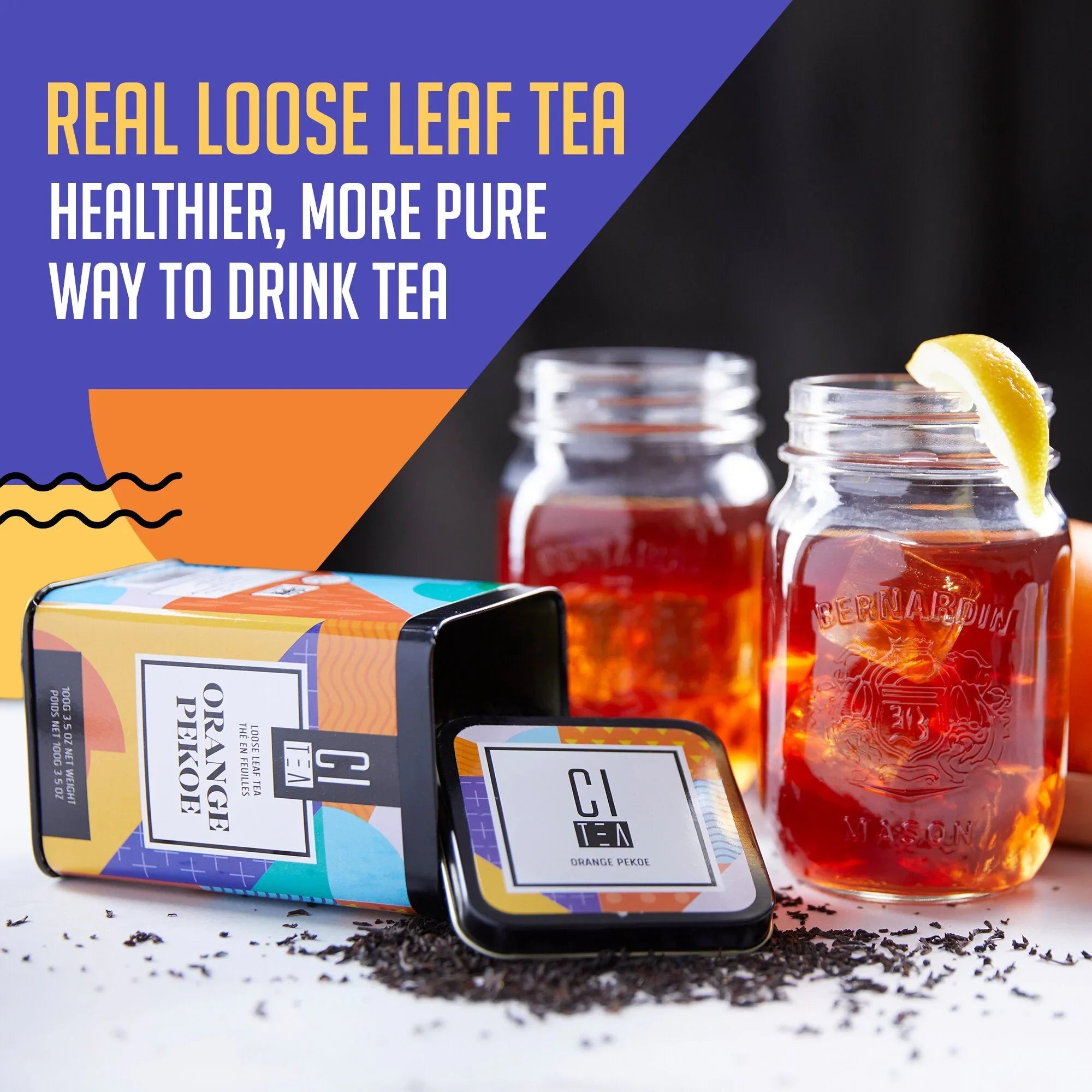 Loose leaf orange pekoe tea tin with tea leaves and iced tea in mason jars with lemon wedge