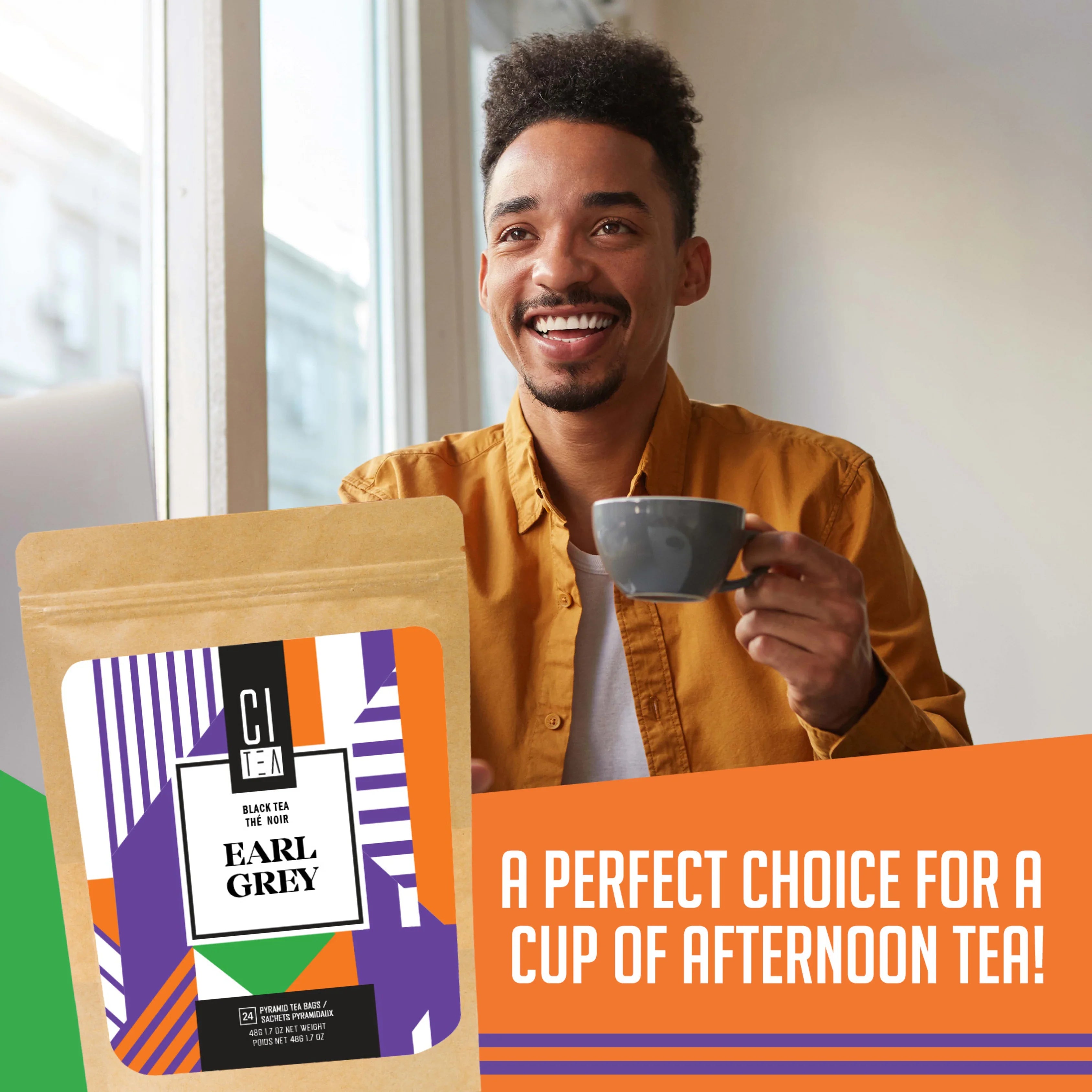 Smiling man enjoying Earl Grey tea by a window, CI Tea Earl Grey black tea packaging visible.