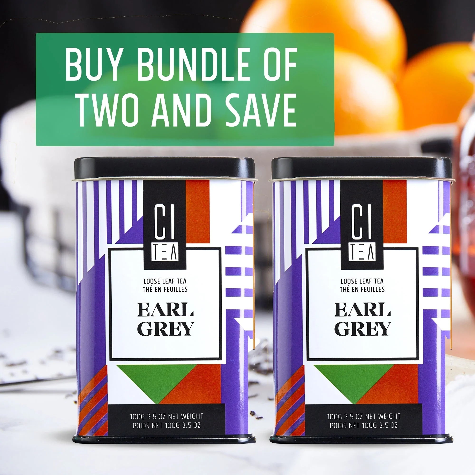 Citea Earl Grey loose leaf tea bundle of two tins with modern packaging and oranges in background