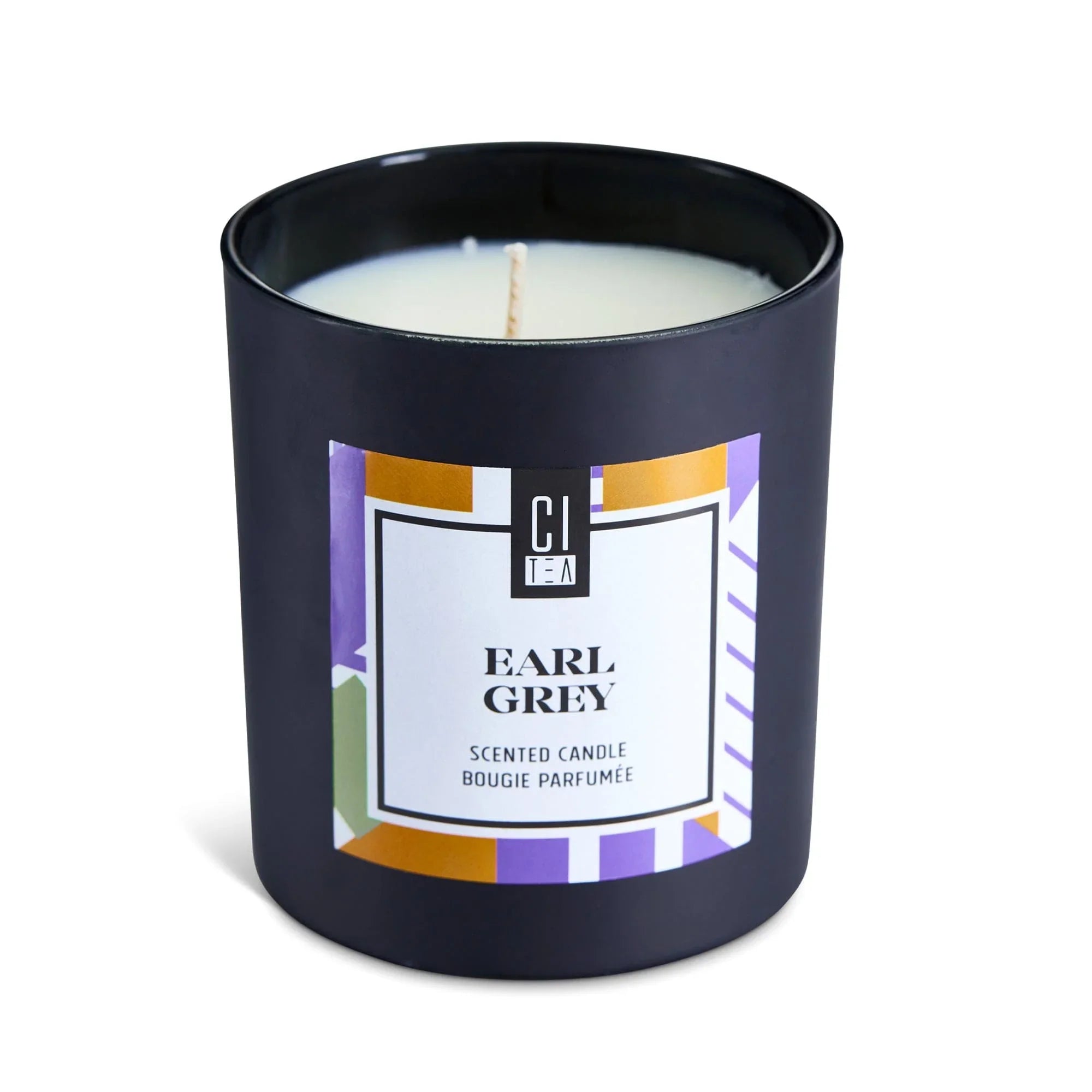 Earl Grey scented candle in a black glass jar with modern label design