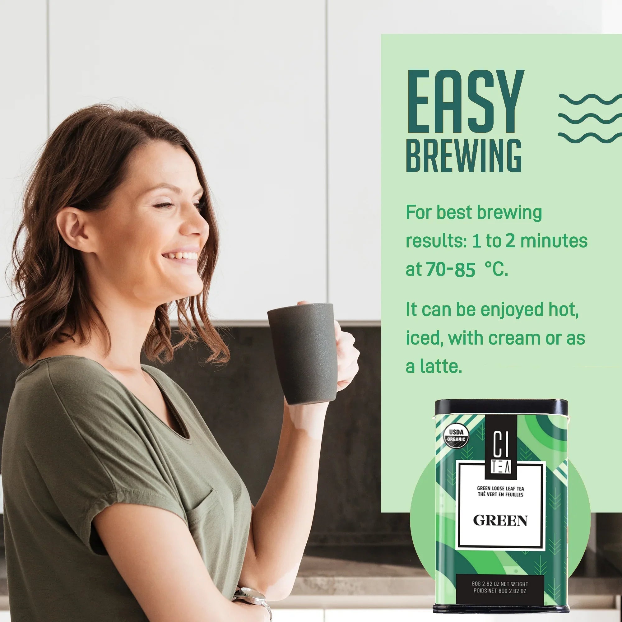 Woman drinking tea in kitchen with CI Tea green loose leaf tea and easy brewing instructions