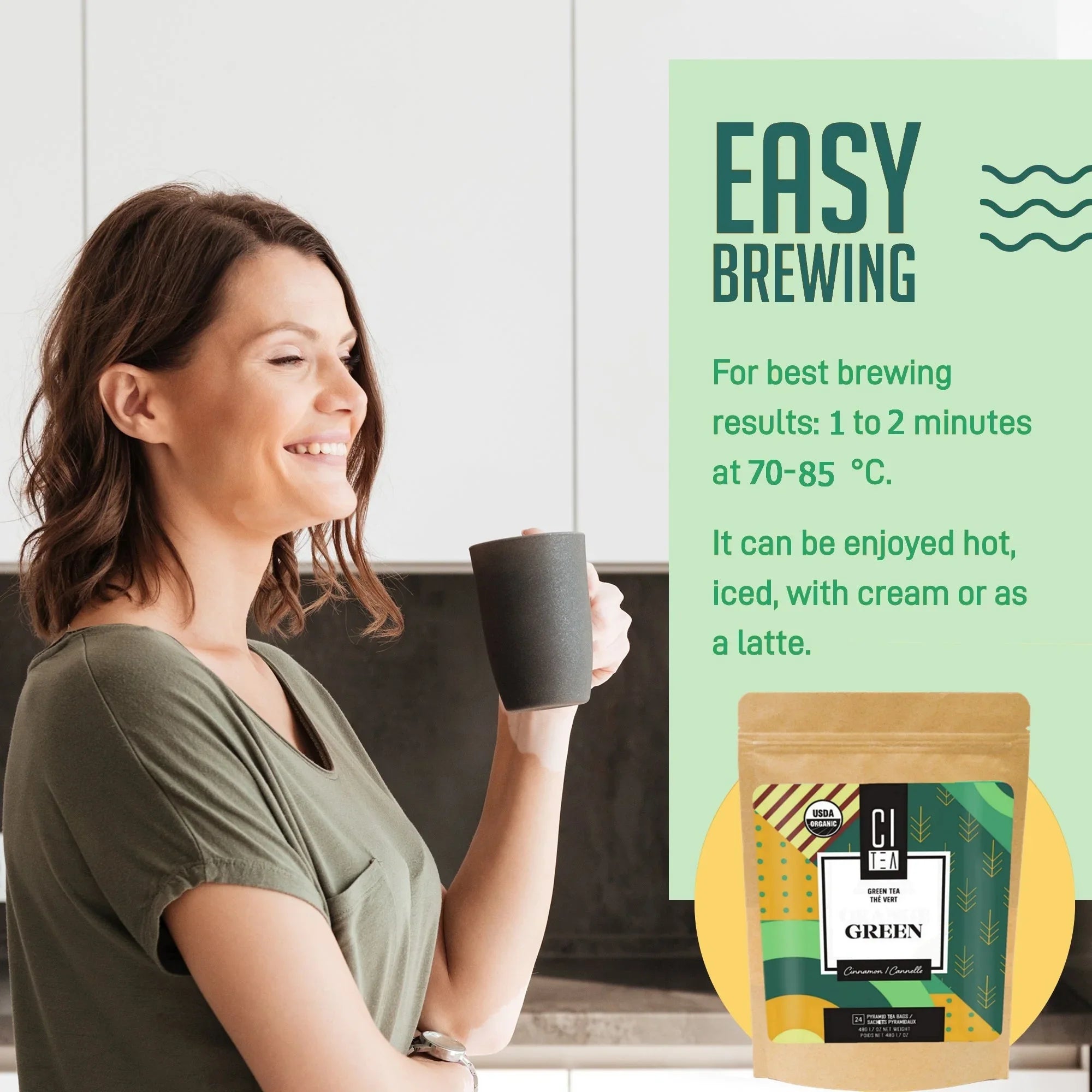 Woman enjoying cup of tea in kitchen with CI Green tea packaging and easy brewing instructions.