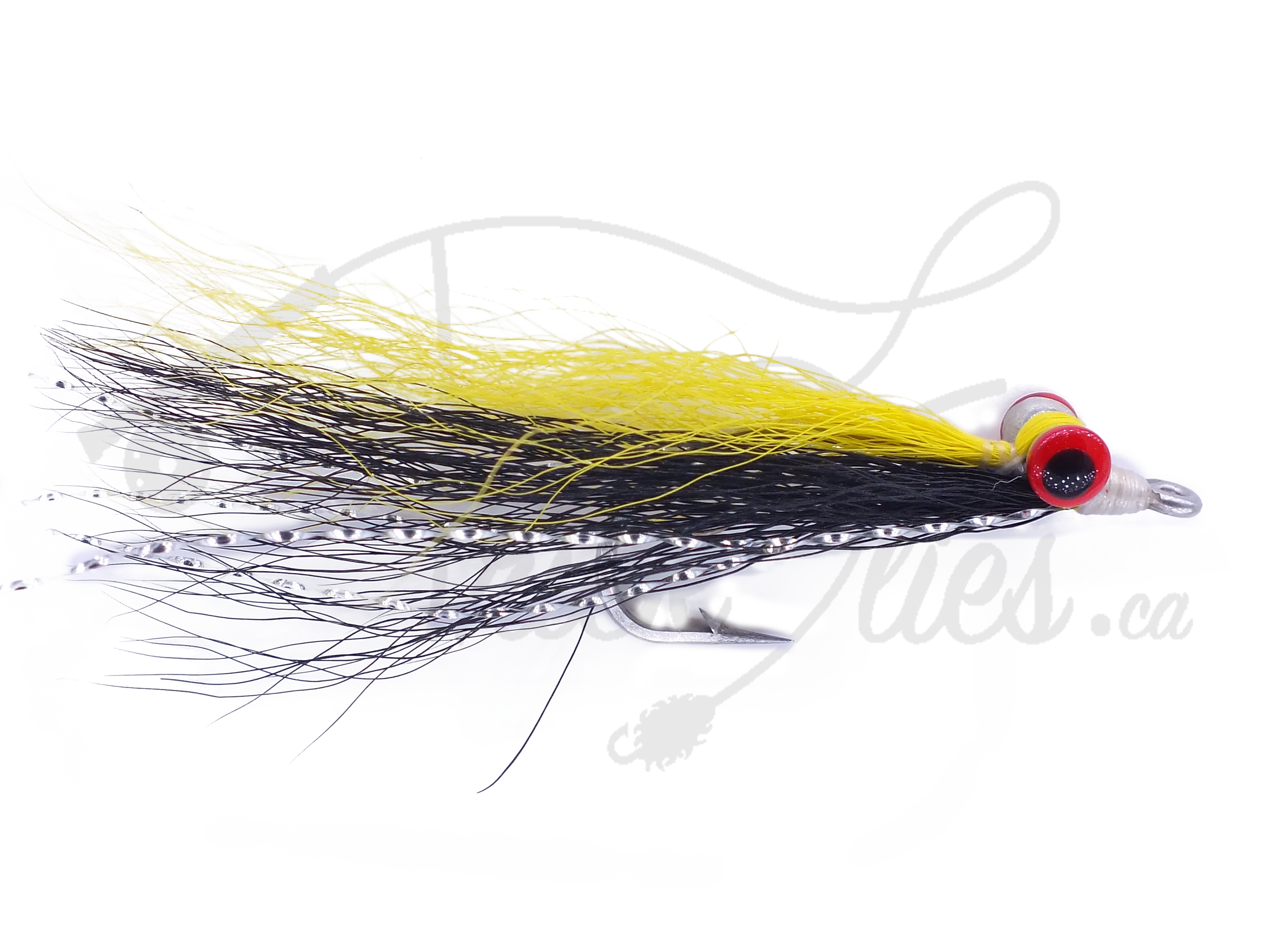 Clouser Minnow yellow and black fishing fly with red dumbbell eyes on white background
