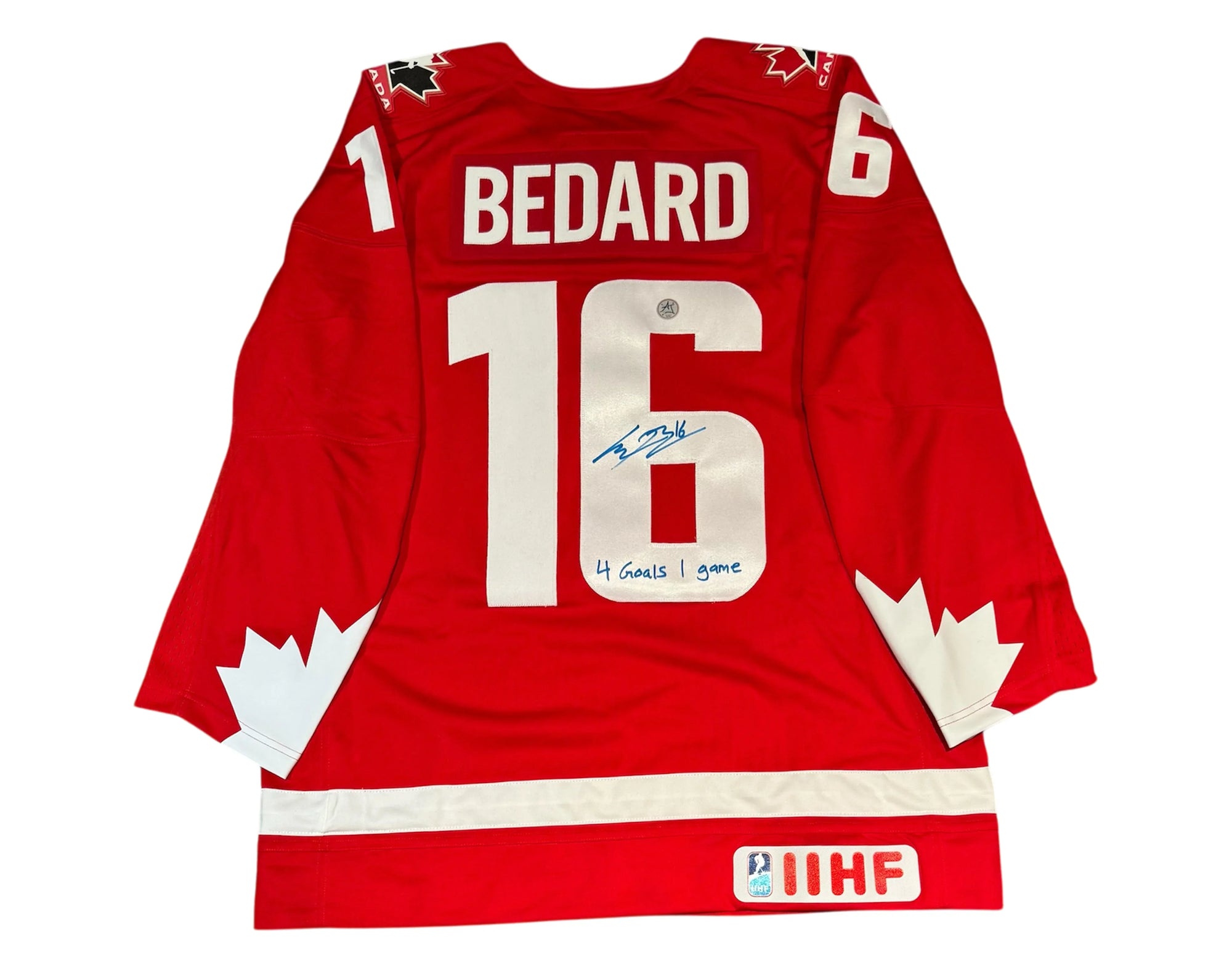 Red Team Canada hockey jersey with Bedard 16, autographed and inscribed '4 Goals 1 Game'.